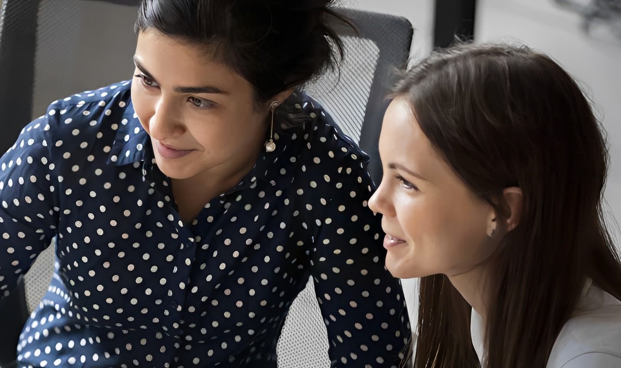 Image of a woman consulting another woman